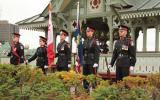 2012 Memorial Service - Officers standing at attention with flags