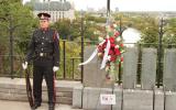 2012 Memorial Service - Officer standing at attention with wreath