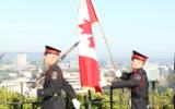 2013 Memorial Service - Officers with guns and flags marching (1)