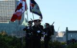 2013 Memorial Service - Officers with guns and flags marching (2)
