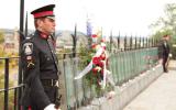2012 Memorial Service - Officer standing at attention with wreath (3)