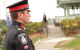2012 Memorial Service - Officer standing at attention near memorial