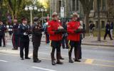 2014 Memorial Service - Officers holding memorial items
