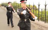 2012 Memorial Service - Officers with rifles marching to memorial service