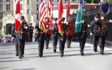 2014 Memorial Service - Officers with flags walking to memorial service