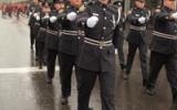 2012 Memorial Service - Officers marching in front of onlookers
