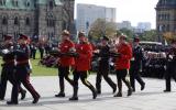 2014 Memorial Service - Officers with memorial items marching to memorial service