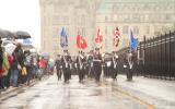 2012 Memorial Service - Officers with flags marching to memorial service