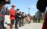 2013 Memorial Service - Officers presenting memorial items at attention (2)