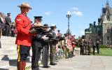 2013 Memorial Service - Officers presenting memorial items at attention (3)