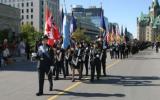 2004 Memorial Service - Officers marching with flag (10)